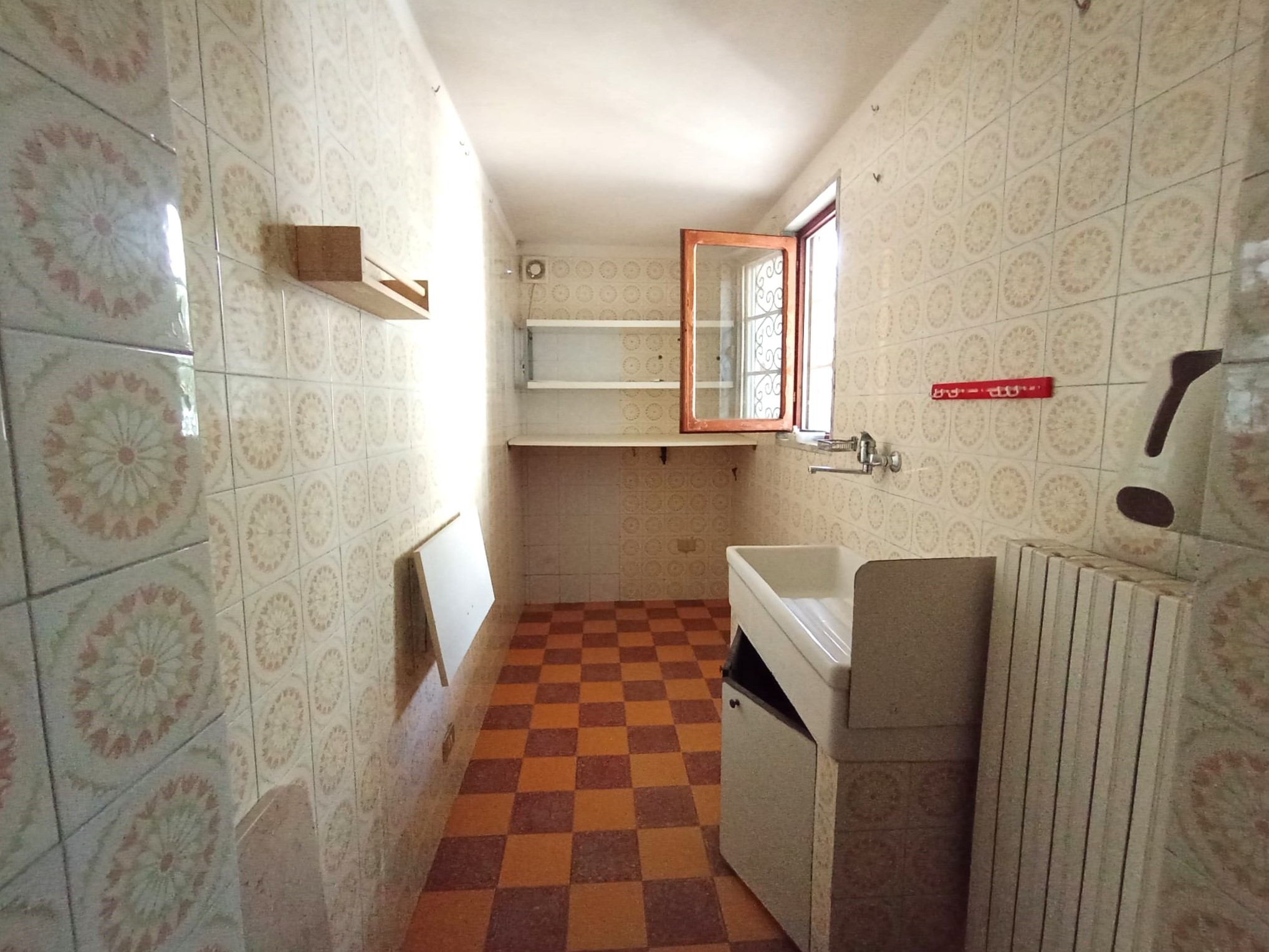TRILOCALE CON GIARDINO PRIVATO