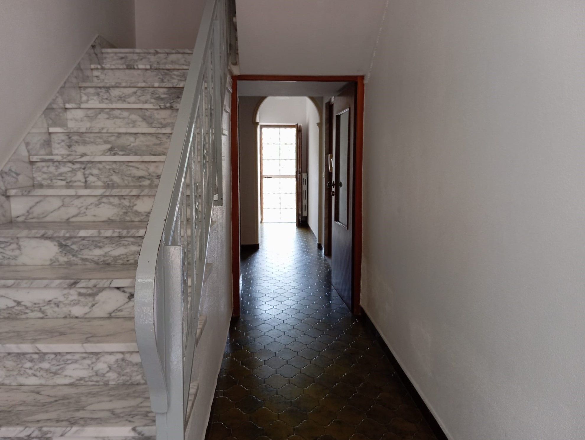 TRILOCALE CON GIARDINO PRIVATO