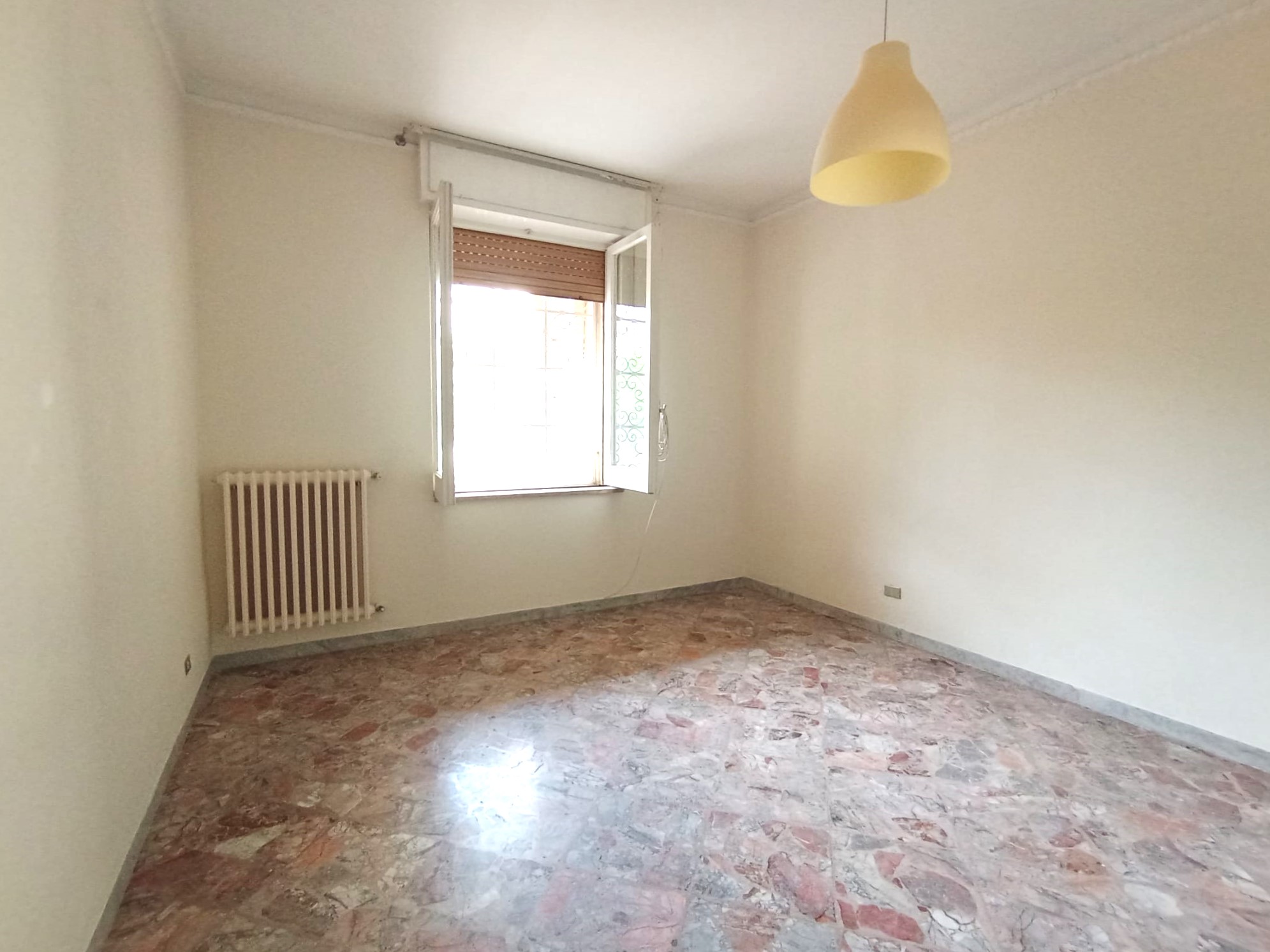 TRILOCALE CON GIARDINO PRIVATO